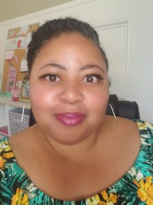 African American Woman wearing a goddess braid